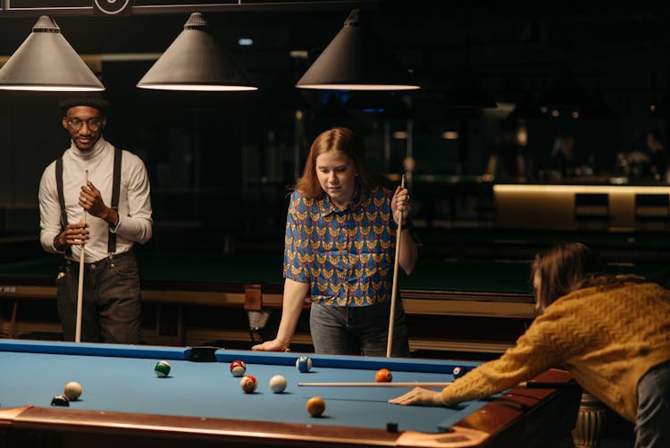 Friends Playing Billiards