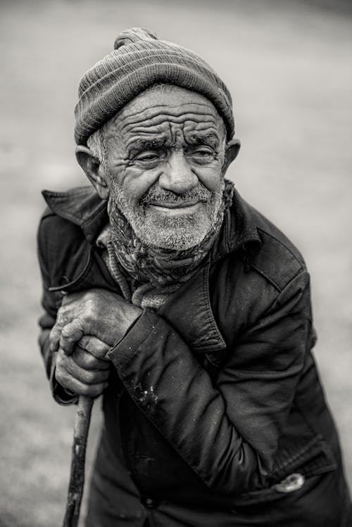 Grayscale Photo of an Elderly Man 