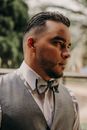 Masculine ethnic man in stylish wear in daytime