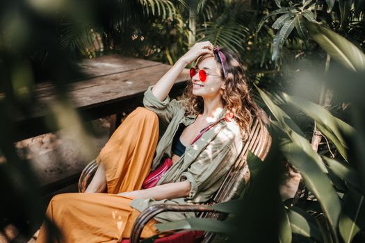 A Beautiful Woman Sitting on a Chair