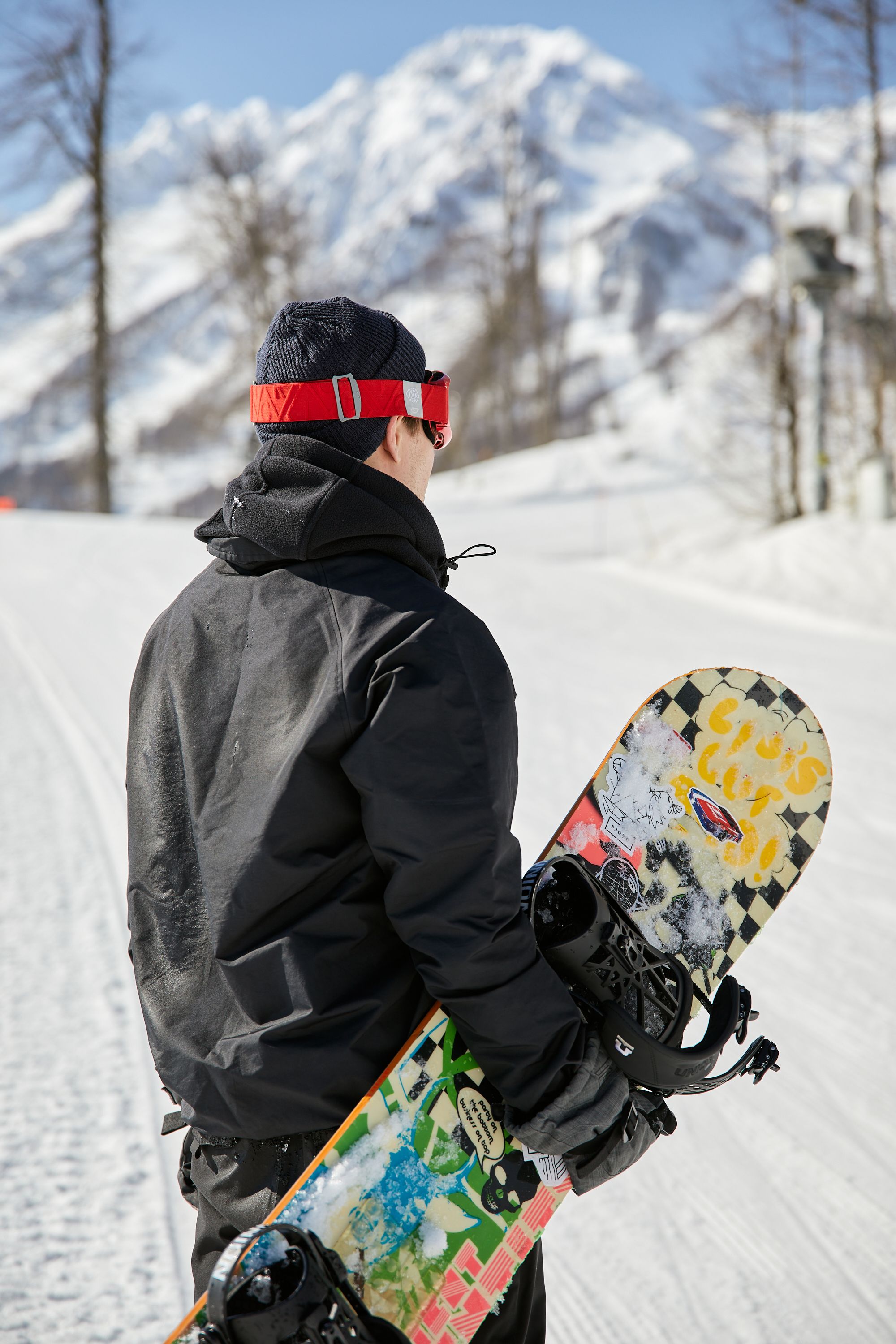 A Man Carrying His Snowboard · Free Stock Photo