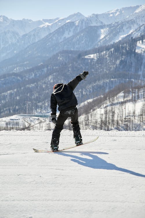 A Man Snowboarding 