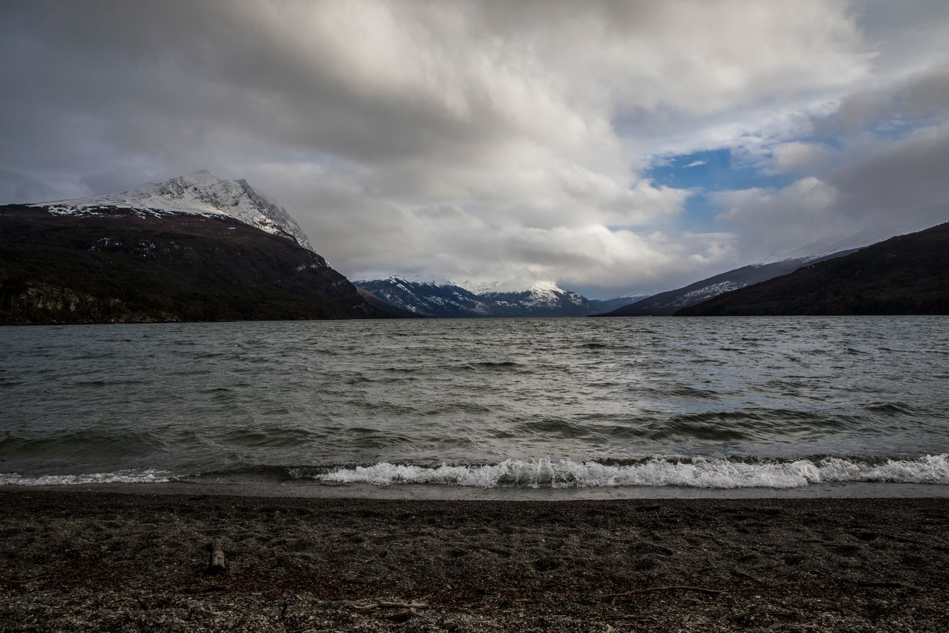 Captivating view of a Patagonian lake with mountains and clouds in Chile.