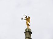 Gold Angel Statue Under White Sky