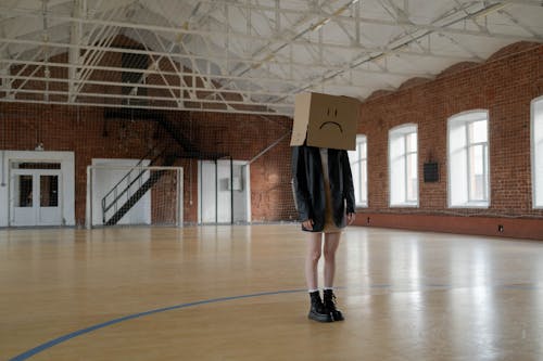 Girl with Brown Box on Her Head