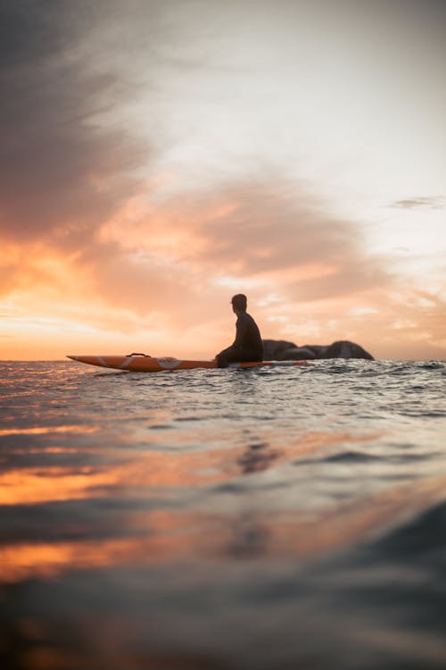 A Surfer during the Twilight