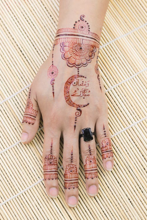 Close-Up Shot of a Person with Mehndi Tattoo