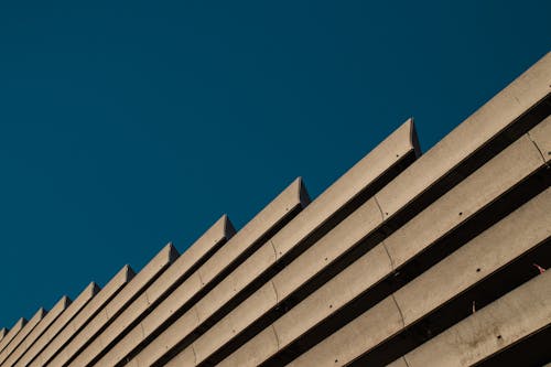 Concrete Building Exterior Under Blue Sky