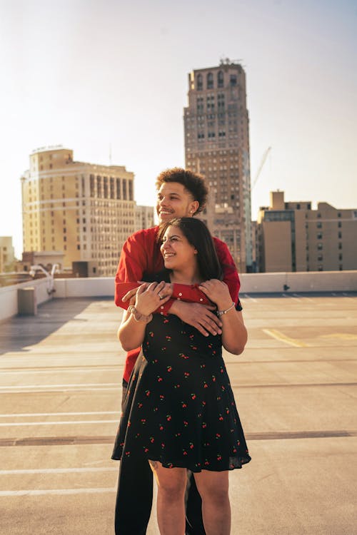 A Couple on a Building Rooftop