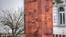 Sculpted Figures on a Clay Wall