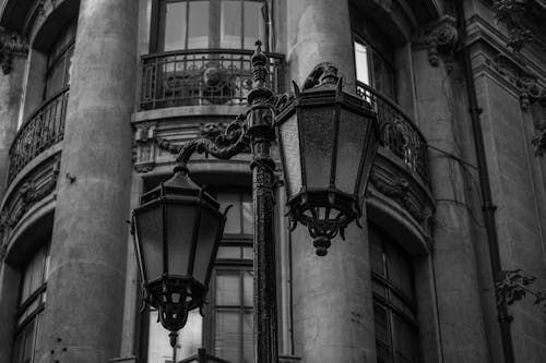 A Building and a Street Lamp in Black and White