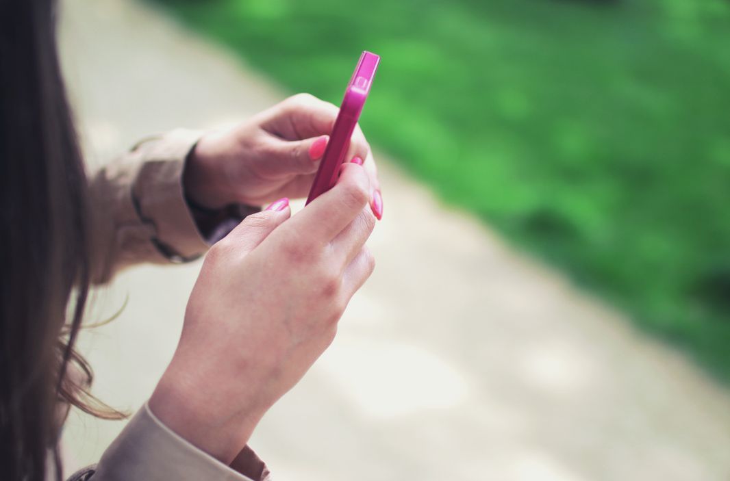 professionals using dating app on tablet during coffee break