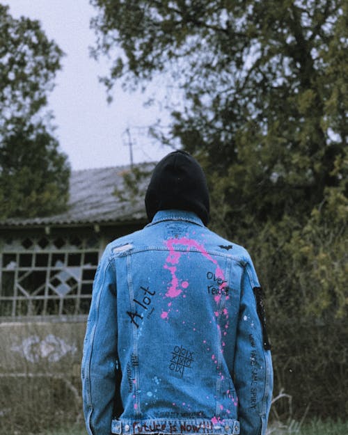 Back View of a Person Wearing Denim Jacket