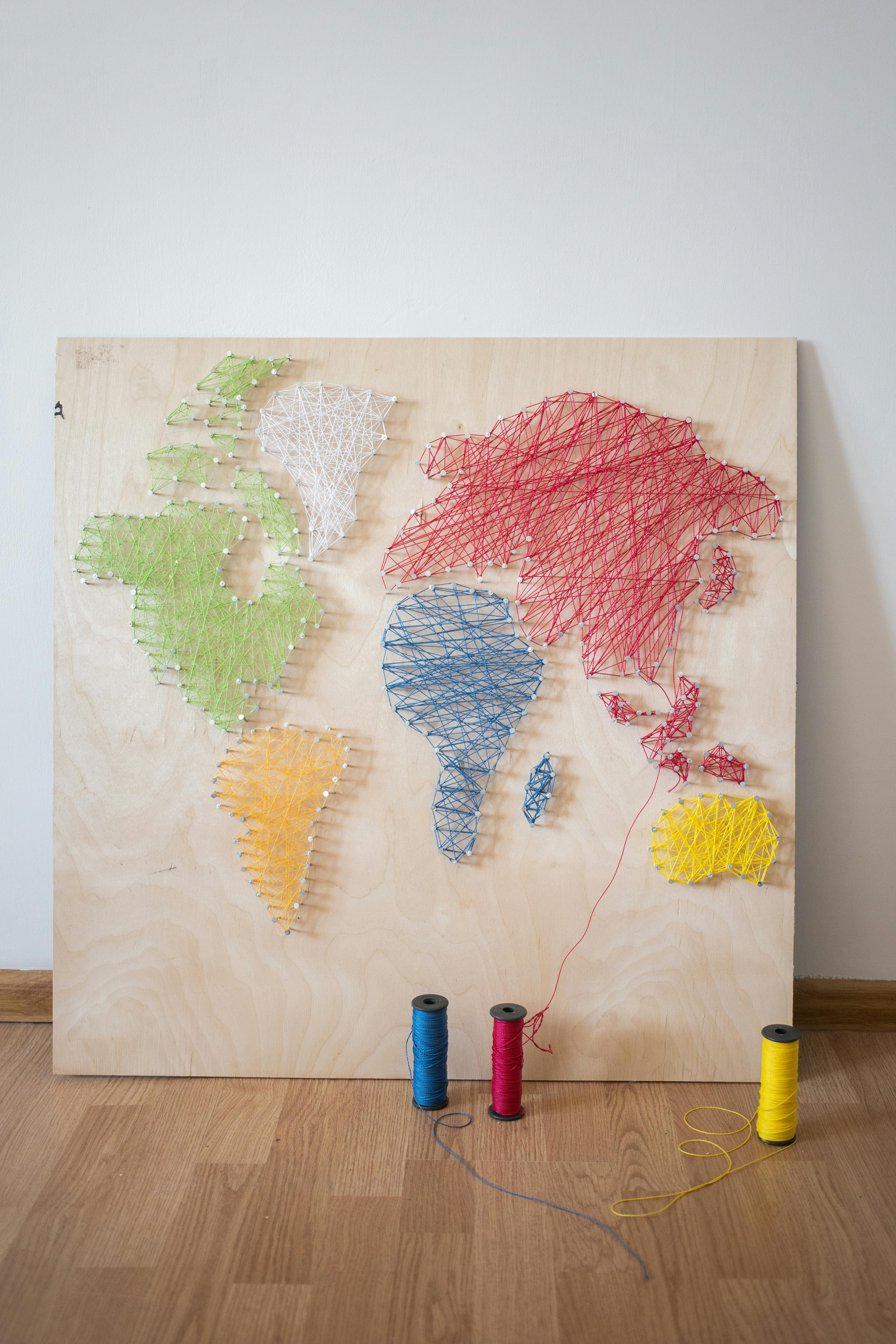 creative string artwork of world map