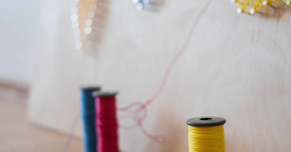 Colorful Spools of Threads and a String Art · Free Stock Photo