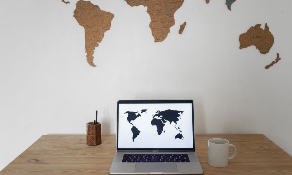computer desk travel planning maps