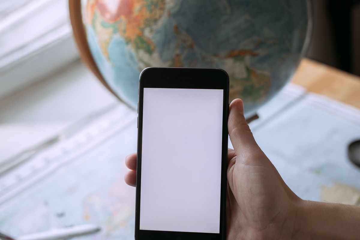 Traveller planning next steps on a phone