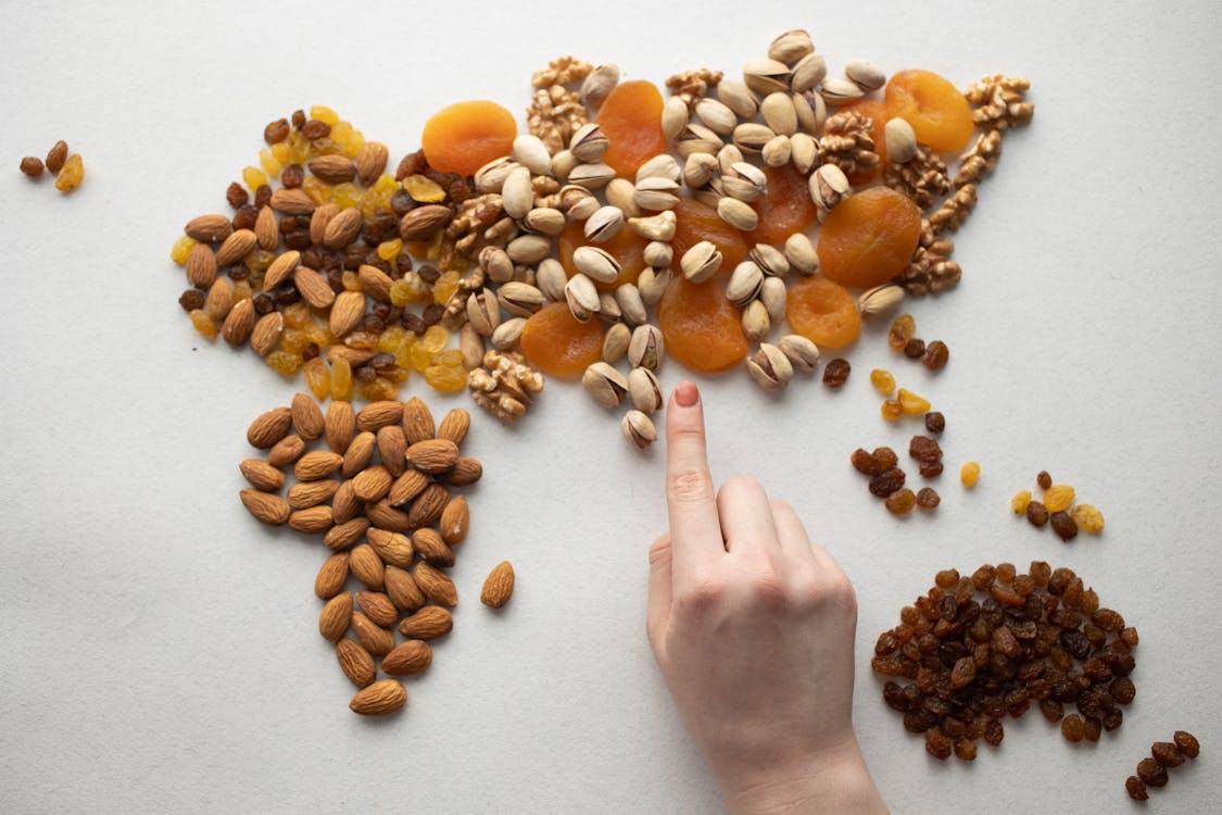 Free Assorted Nuts on a Gray Table Stock Photo