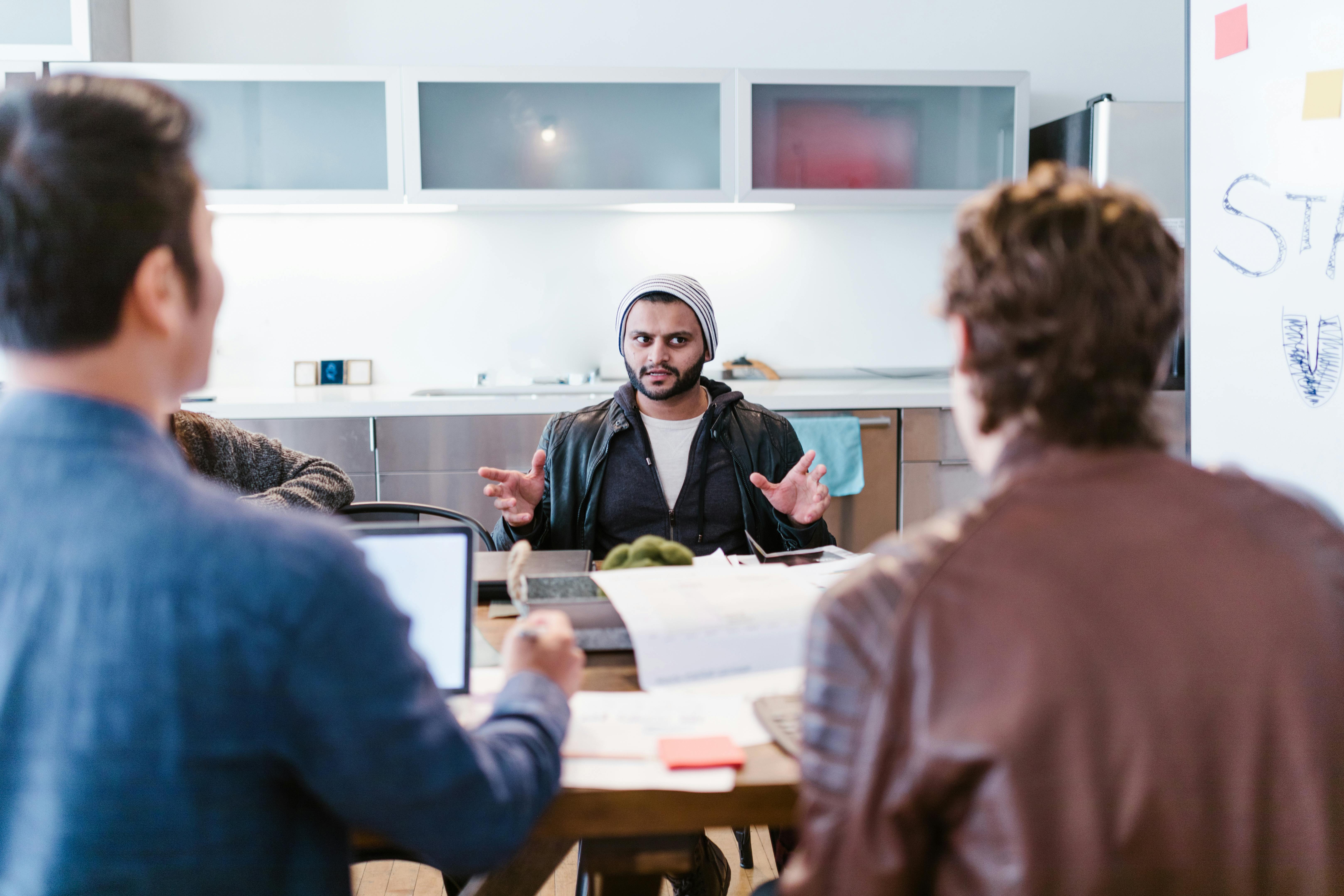 photo of men discussing