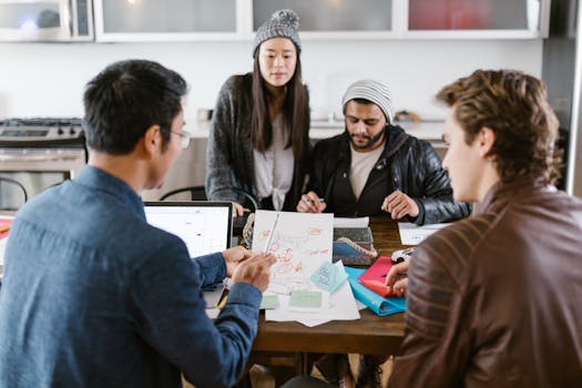 Group of diverse adults brainstorming ideas during a meeting in an office setting.
