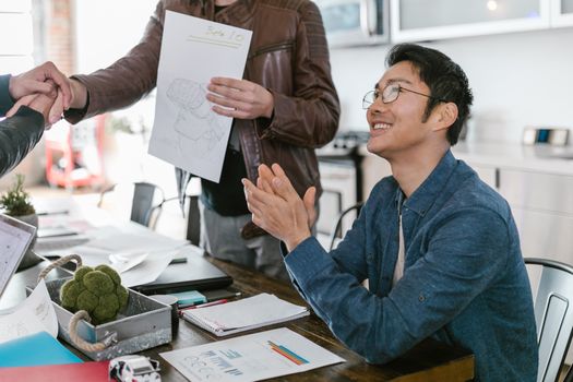 Photo of a Person Clapping