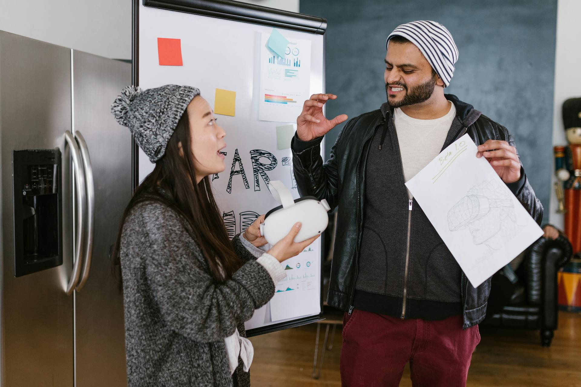 A dynamic team of young entrepreneurs brainstorms VR innovations in a modern workspace.