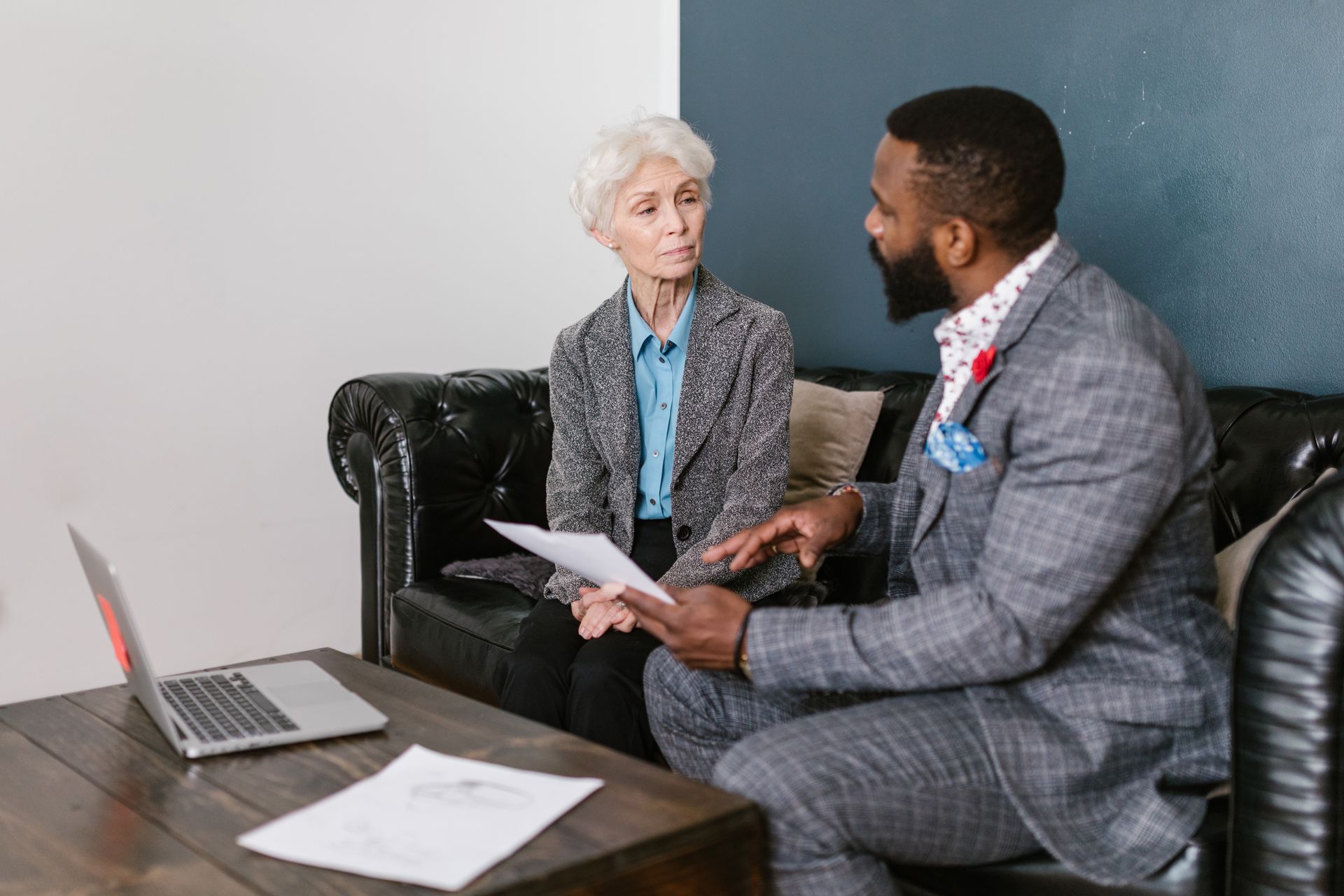 A Man and an Elderly Woman Having a Discussion