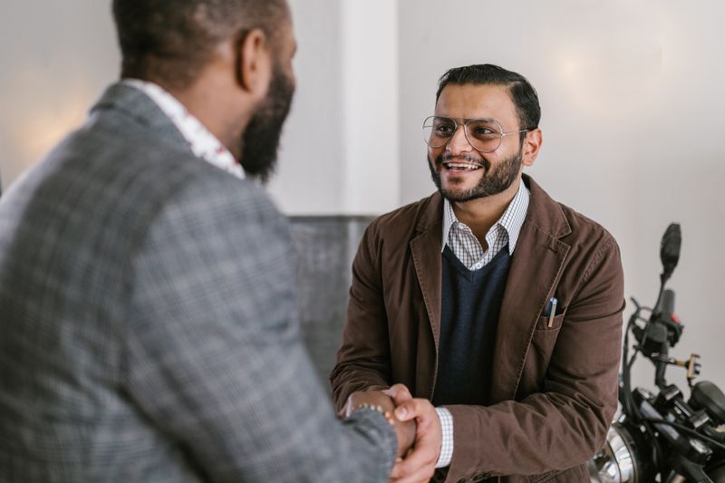 Business partners shaking hands