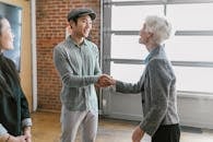 A Man and a Woman Handshaking