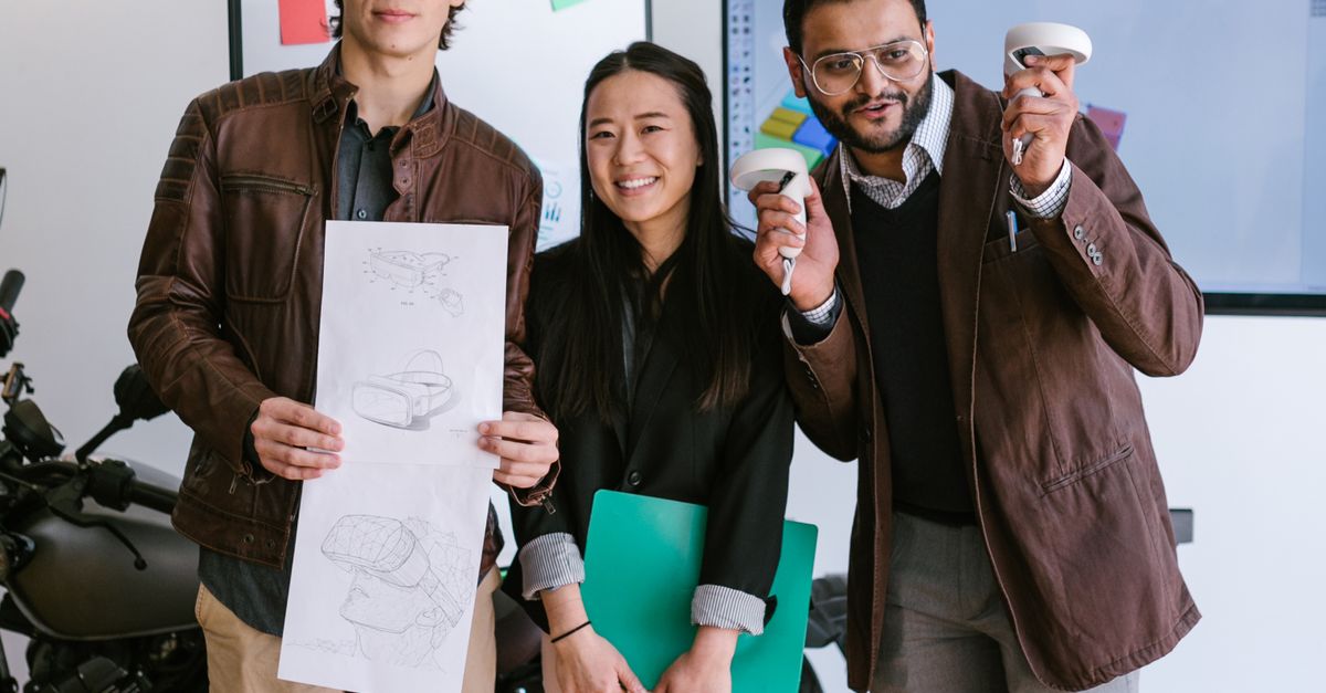 Photo by RDNE Stock project Three diverse entrepreneurs showcasing their startup ideas with creativity and collaboration indoors.