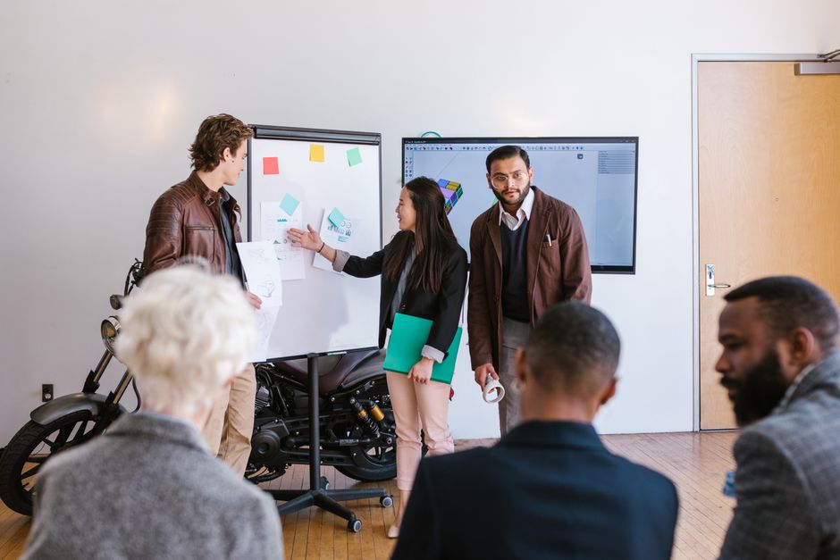 Developers collaborating on a digital whiteboard to plan a software architecture - atomic object llc Developers collaborating on a digital whiteboard to plan a software architecture - atomic object llc
