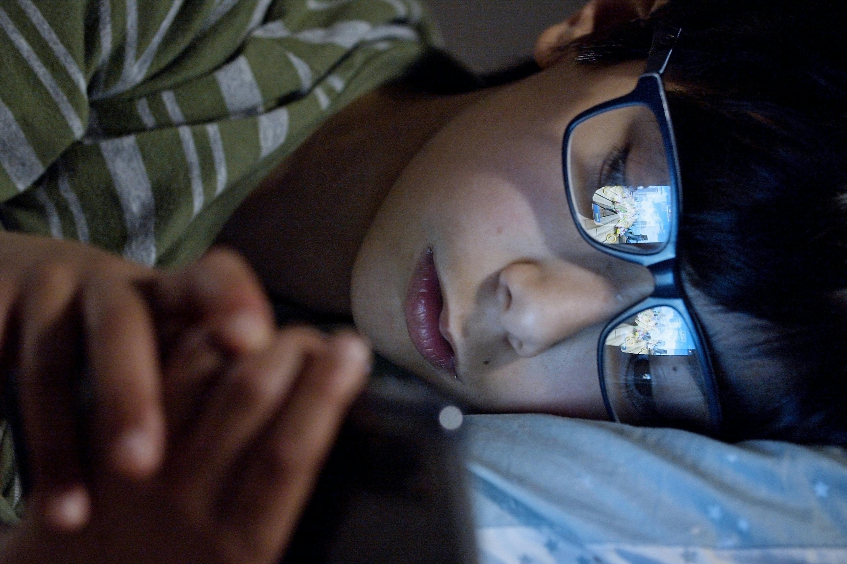 woman in black framed eyeglasses