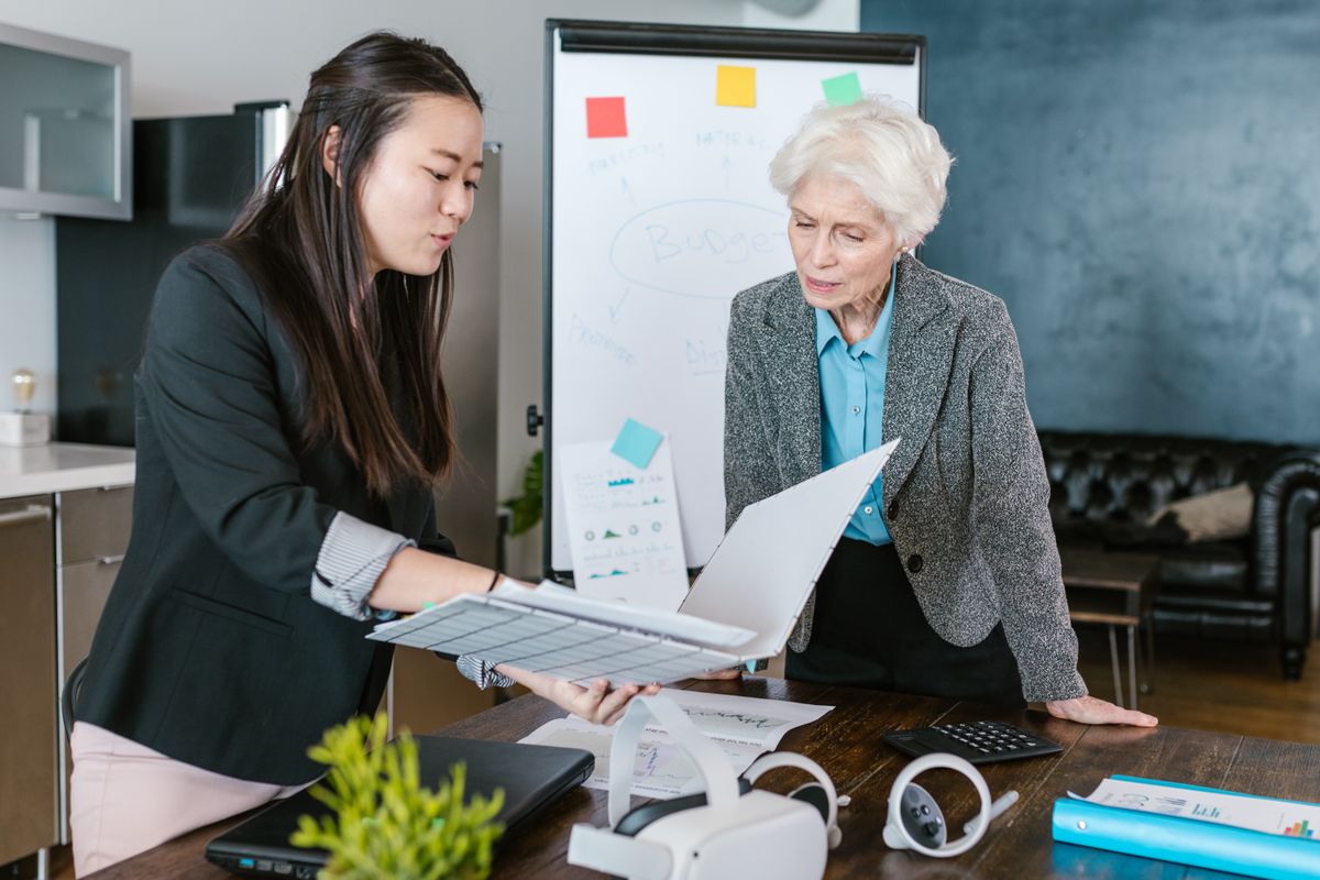 Cross-cultural business discussion in a modern office