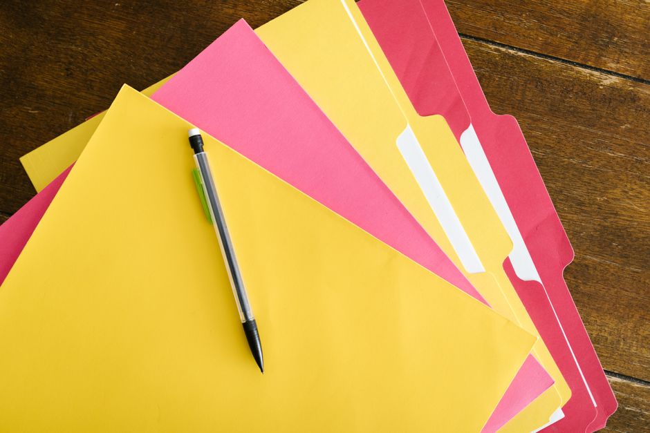 pexels photo 7414277 Navigating Mortgage Insurance: Options for Your Rental Property Learn how mortgage insurance for rental property works, ways to save, tax tips, and coverage options for landlords and investors. organized folders - mortgage insurance for rental property