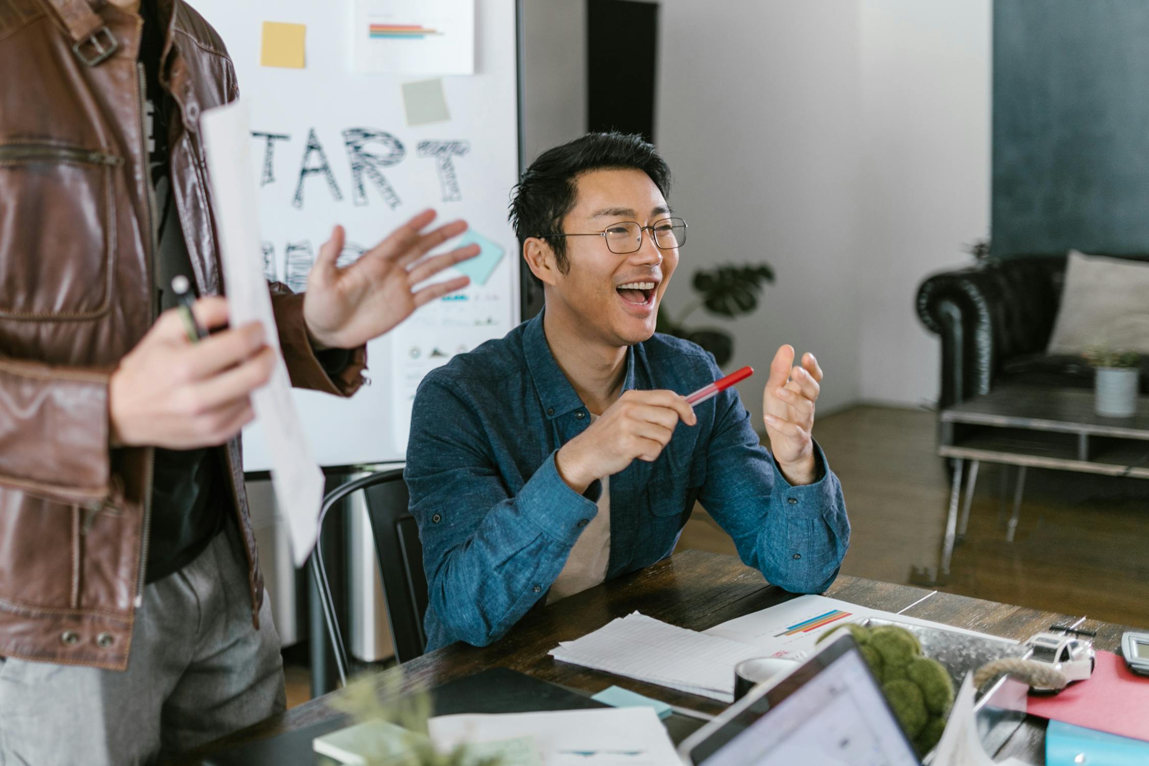 A person happy about getting approved for a start up loan