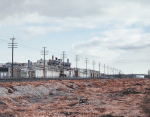 Grassy area near industrial fabric