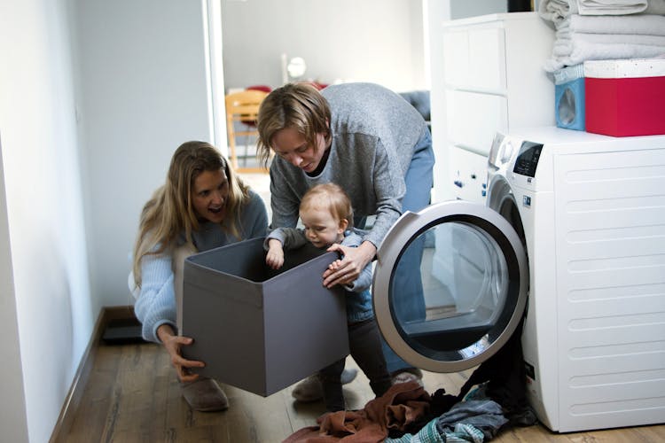 Women Baby Sitting A Toddler
 