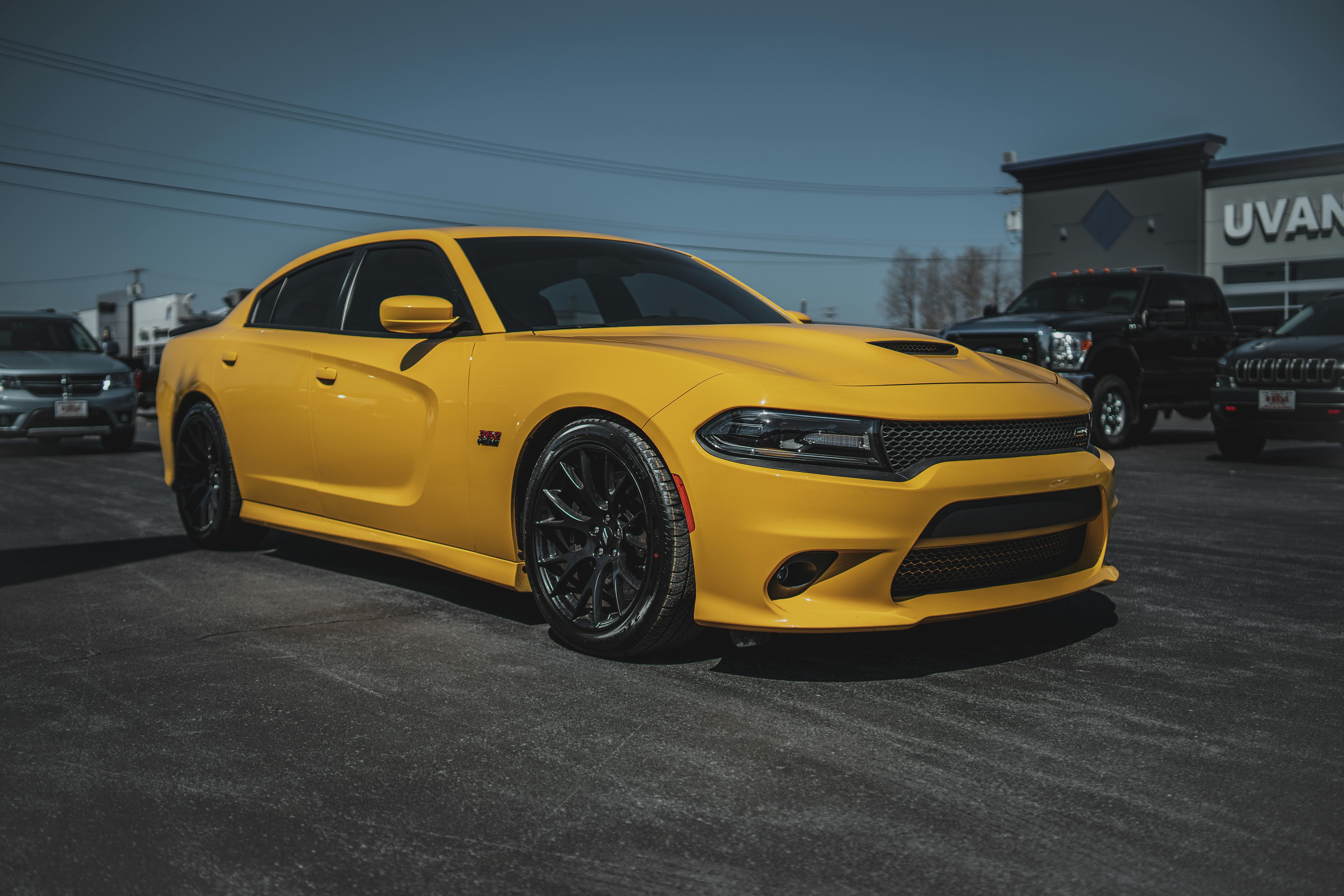 A Parked Yellow Dodge Charger · Free Stock Photo
