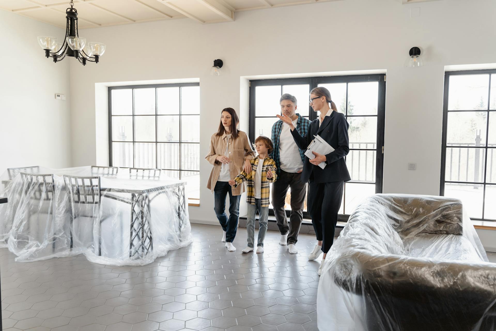 An Agent Touring the Prospect Buyers Around the House