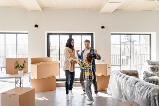 happy homeowner in renovated living room