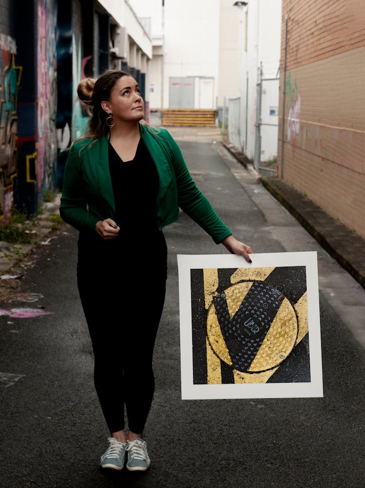 Woman With Abstract Image On Street