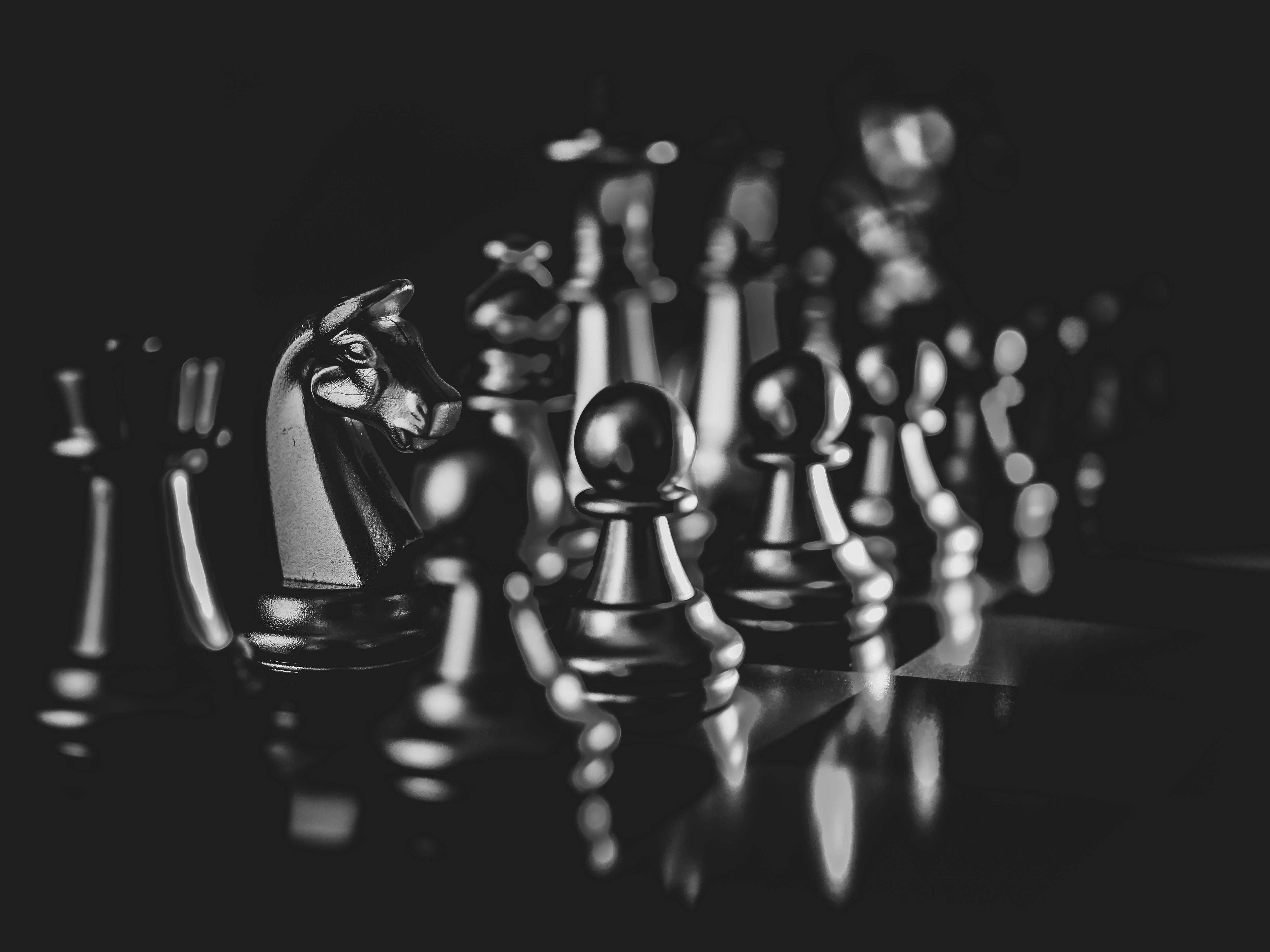 A Black Chess Game With Black Pieces Background Wallpaper Image