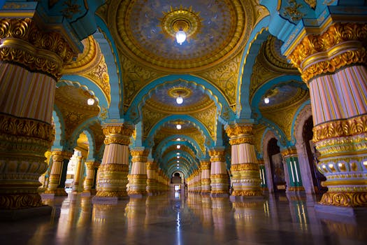 Magnificent interior of the Mysore Palace with grand arches and stunning architectural details.