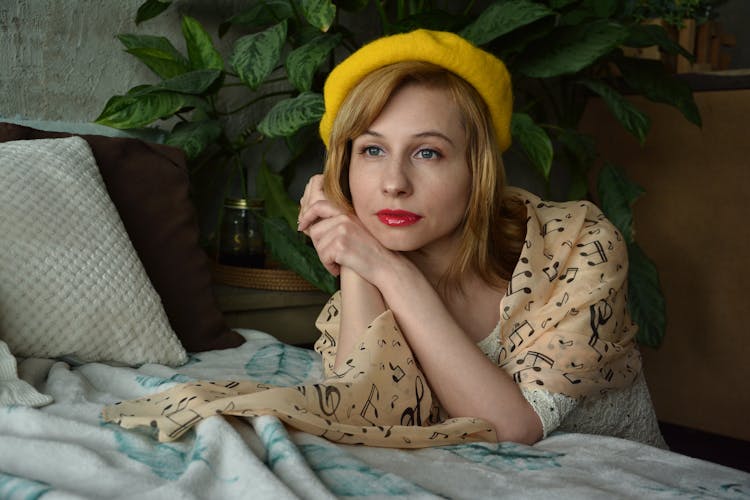 Studio Shot Of Pretty Female In Yellow Beret