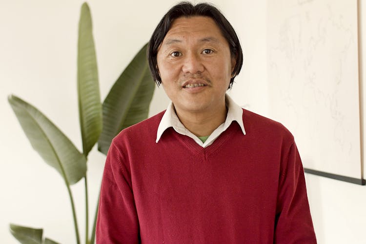 Close-Up Shot Of A Man Wearing His Red Sweater