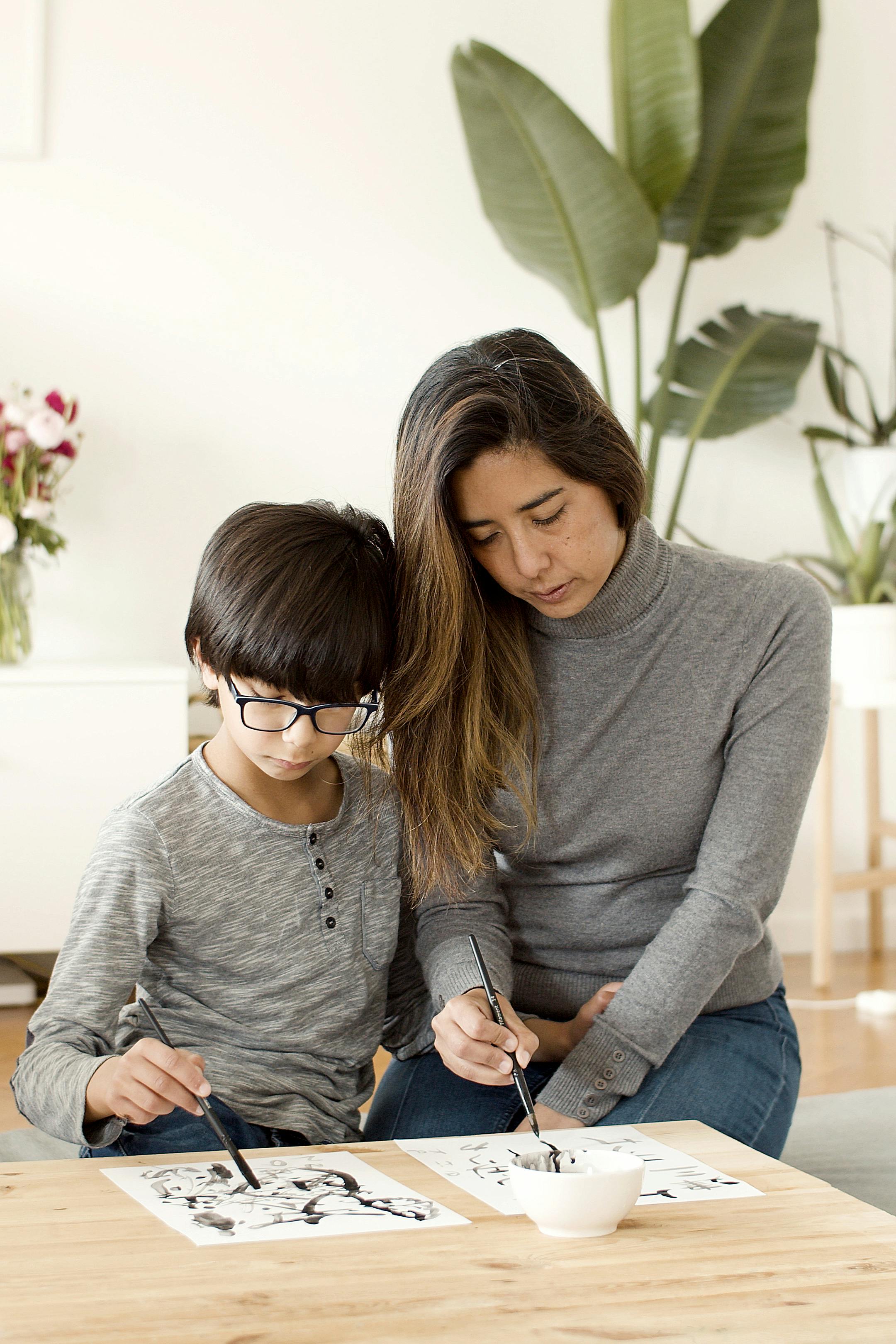 mother and son painting