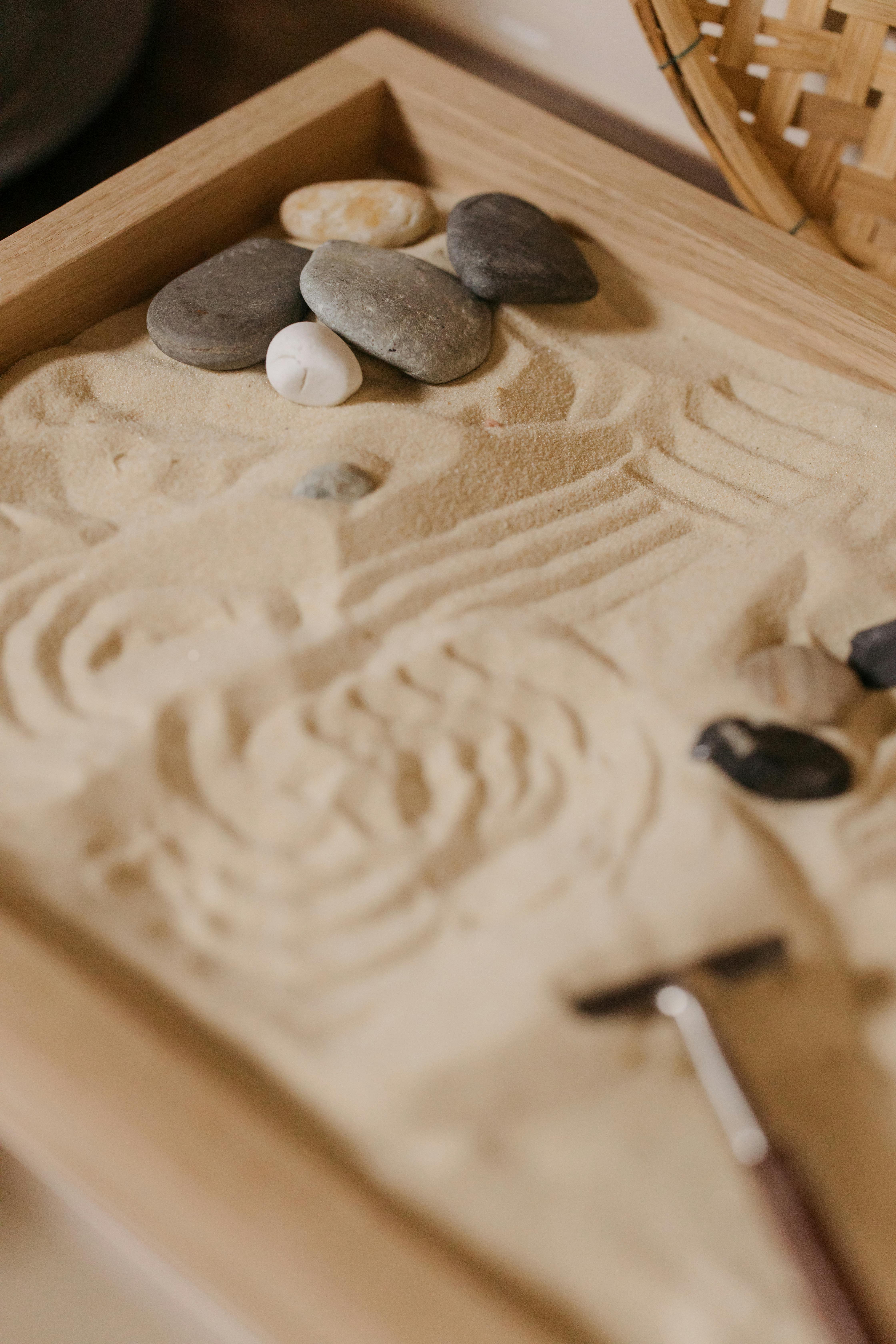 black and white stones on table zen garden