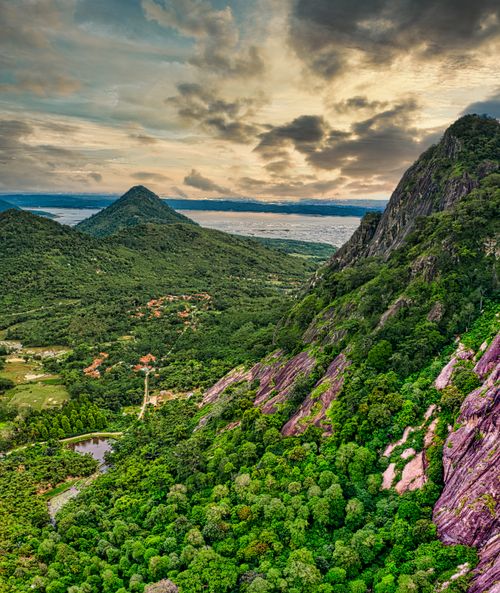 Free Breathtaking aerial shot of lush mountains in Purwakarta, West Java, Indonesia at sunset. Stock Photo