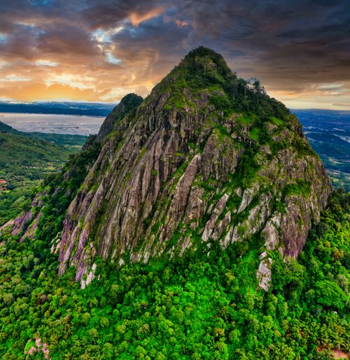 Free Stunning aerial shot of lush green hills and rock formations in Purwakarta, West Java. Stock Photo