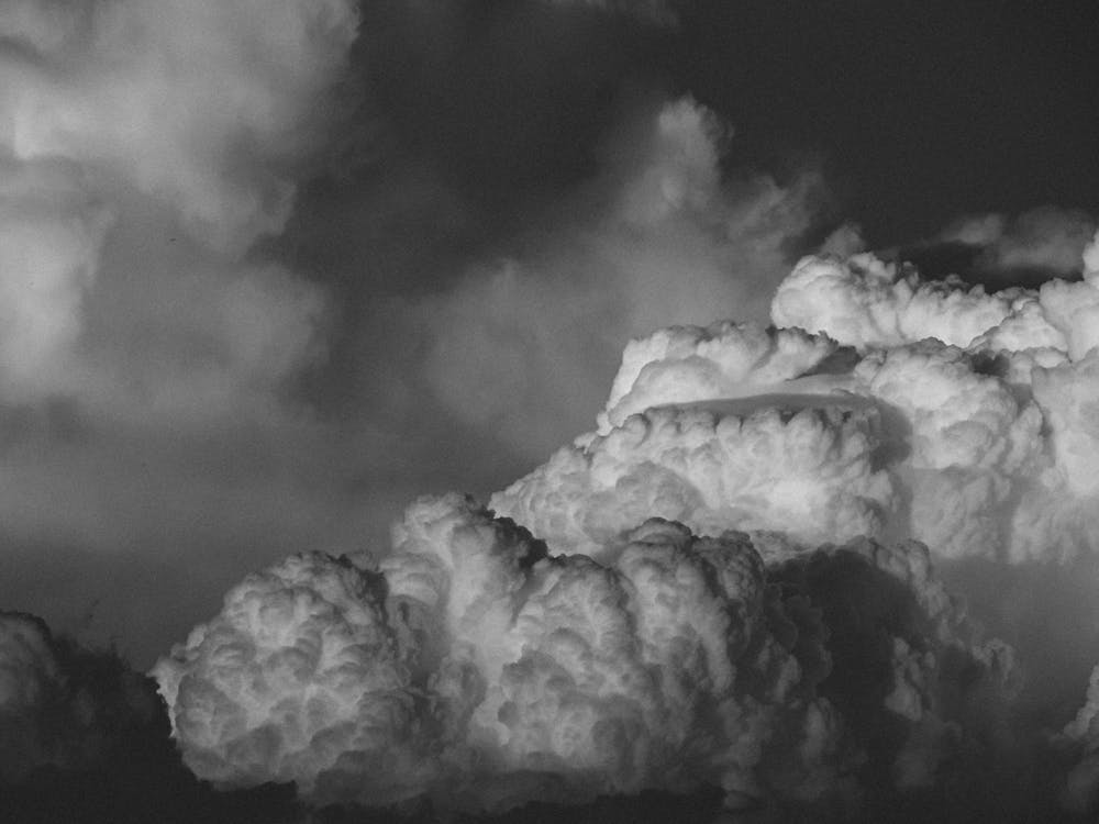 A Grayscale of a Cloudy Sky · Free Stock Photo